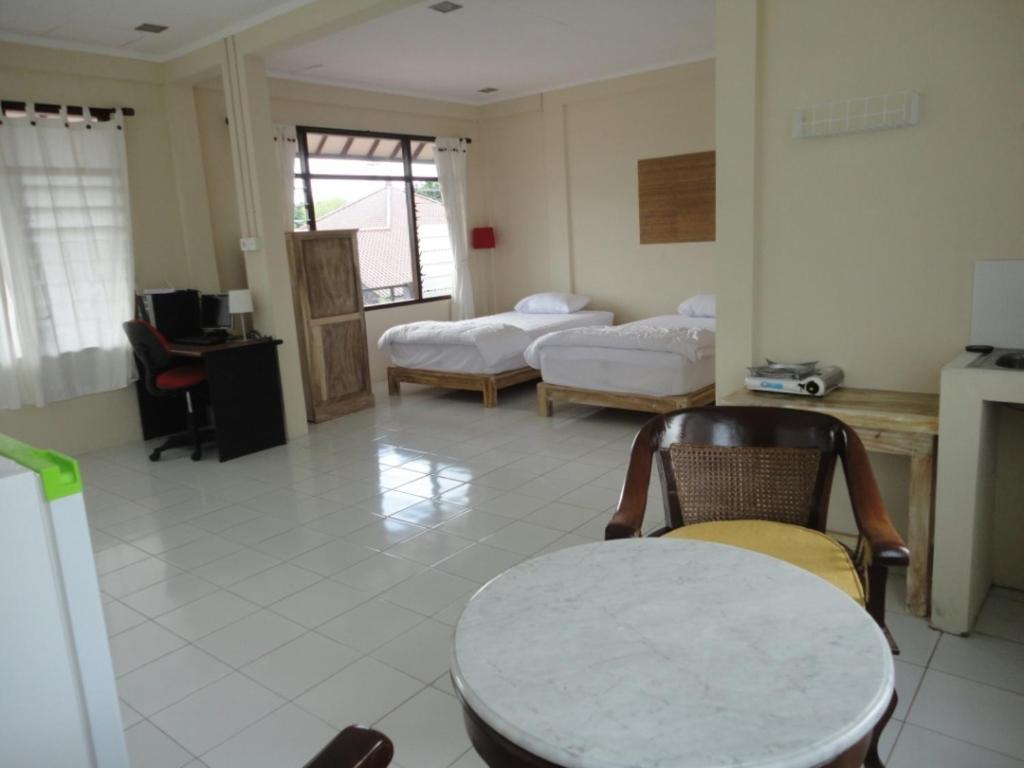 Urbanview Hotel Wayan Mansion Denpasar Rum bild