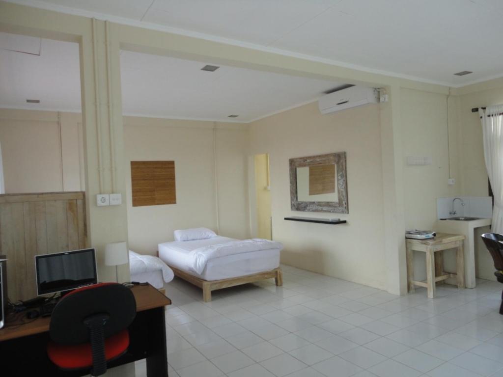 Urbanview Hotel Wayan Mansion Denpasar Rum bild